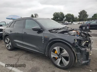 2022 Audi e-tron Premium Plus with VIN WA1LAAGE4NB014605, listed as a Copart auction lot 61127385 with 26,355 mi miles and Salvage title. Bid and sale history available at DreamBid. Image 4.