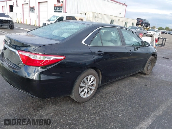 2015 Toyota Camry XLE with VIN 4T4BF1FK9FR461402, listed as a IAAI auction lot 41772628 with 92,795 mi miles and . Bid and sale history available at DreamBid. Image 4.
