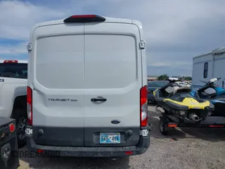 2019 Ford Transit with VIN 1FTYR2CM3KKB86806, listed as a IAAI auction lot 42633294 with 148,555 mi miles and . Bid and sale history available at DreamBid. Image 16.