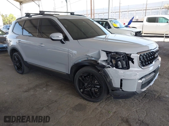 2023 Kia Telluride EX X-Line z VIN 5XYP3DGC0PG395945, wystawiony jako IAAI lot #42544923 z przebiegiem 19 046 mil mil oraz . Historia ofert i sprzedaży dostępna na DreamBid. Obrazek 1.
