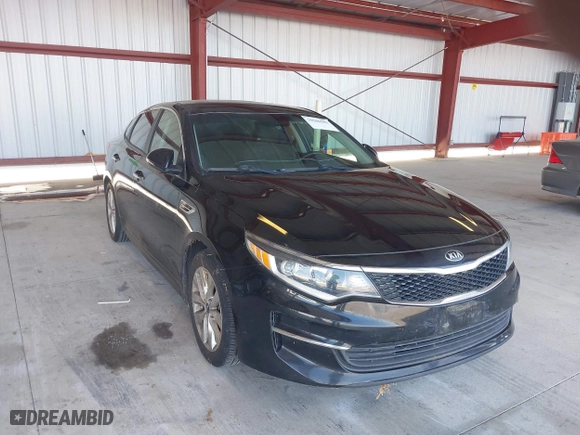 2016 Kia Optima LX with VIN 5XXGT4L33GG064125, listed as a IAAI auction lot 39506983 with 131,976 mi miles. Bid and sale history available at carsss.com. Image 1.