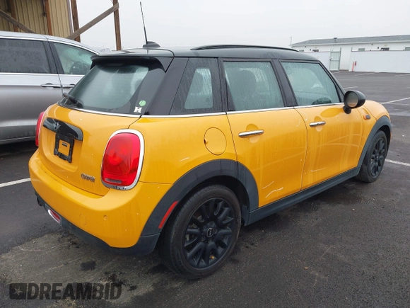 2018 MINI Hardtop 4 Door Cooper with VIN WMWXU1C59J2F79169, listed as a IAAI auction lot 40973679 with 97,507 mi miles and . Bid and sale history available at DreamBid. Image 4.