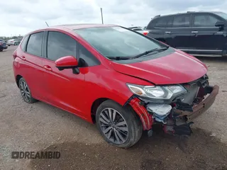 2015 Honda Fit EX-L z VIN 3HGGK5H83FM702448, wystawiony jako IAAI lot #42437625 z przebiegiem 117 291 mil mil oraz . Historia ofert i sprzedaży dostępna na DreamBid. Obrazek 1.