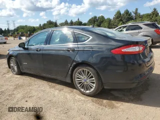 2013 Ford Fusion SE Hybrid с VIN 3FA6P0LU2DR181215, выставлен на аукционе Copart как лот 62474965 с пробегом 149 492 миль миль и Списание • Salvage title. История ставок и продаж доступна на DreamBid. Изображение 2.