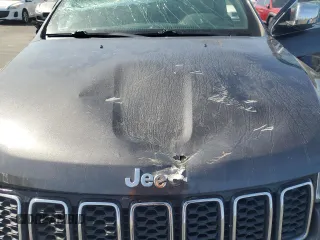 2018 Jeep Grand Cherokee Limited with VIN 1C4RJEBG5JC301438, listed as a Copart auction lot 61646835 with 66,568 mi miles and Salvage title. Bid and sale history available at DreamBid. Image 12.