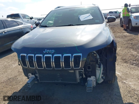 2020 Jeep Cherokee Altitude with VIN 1C4PJLLB5LD580742, listed as a IAAI auction lot 41483128 with 77,127 mi miles. Bid and sale history available at carsss.com. Image 6.