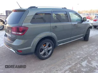 2017 Dodge Journey Crossroad Plus with VIN 3C4PDDGG5HT517581, listed as a IAAI auction lot 41225446 with 136,193 mi miles and . Bid and sale history available at DreamBid. Image 4.