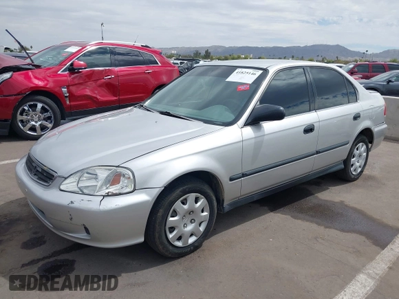 1999 Honda Civic LX with VIN JHMEJ6671XS003027, listed as a IAAI auction lot 41825146 with 197,764 mi miles and . Bid and sale history available at DreamBid. Image 2.