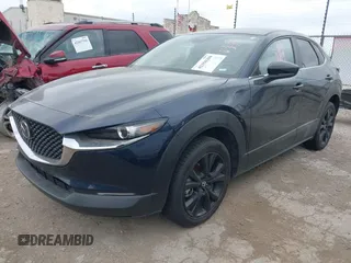 2024 Mazda CX-30 2.5 S Select Sport with VIN 3MVDMBBM2RM667016, listed as a IAAI auction lot 42156206 with 19,471 mi miles and . Bid and sale history available at carsss.com. Image 2.