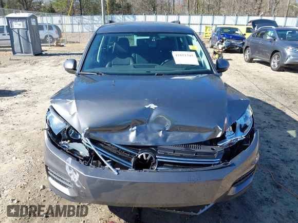 2014 Volkswagen Tiguan SE z VIN WVGAV3AX0EW511694, wystawiony jako IAAI lot #41811345 z przebiegiem 95 129 mil mil oraz . Historia ofert i sprzedaży dostępna na DreamBid. Obrazek 12.