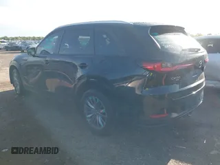 2024 Mazda CX-90 Select z VIN JM3KKAHD3R1165975, wystawiony jako IAAI lot #42086144 z przebiegiem 10 317 mil mil oraz . Historia ofert i sprzedaży dostępna na DreamBid. Obrazek 3.