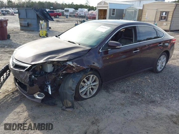 2013 Toyota Avalon XLE with VIN 4T1BK1EB1DU026863, listed as a IAAI auction lot 41644969 with 190,020 mi miles and . Bid and sale history available at DreamBid. Image 2.