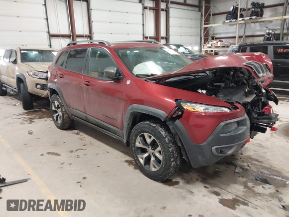 2015 Jeep Cherokee Trailhawk with VIN 1C4PJMBS7FW646577, listed as a IAAI auction lot 41404911 with 85,343 mi miles and . Bid and sale history available at DreamBid. Image 1.