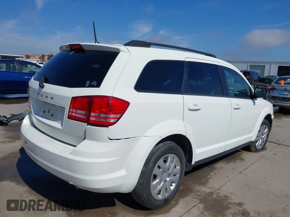 2019 Dodge Journey SE Value with VIN 3C4PDCAB1KT868065, listed as a IAAI auction lot 41642318 with 97,735 mi miles and . Bid and sale history available at DreamBid. Image 4.