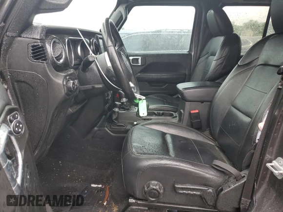 2020 Jeep Wrangler Unlimited Sahara Altitude with VIN 1C4HJXEM5LW293741, listed as a Copart auction lot 58801565 with 97,460 mi miles and Salvage title. Bid and sale history available at DreamBid. Image 7.