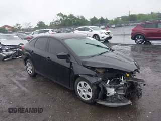 2017 Ford Focus S z VIN 1FADP3E27HL201371, wystawiony jako IAAI lot #42258266 z przebiegiem 68 872 mil mil oraz . Historia ofert i sprzedaży dostępna na DreamBid. Obrazek 1.
