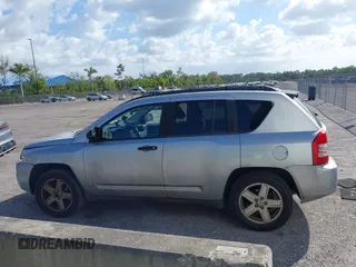2007 Jeep Compass Sport with VIN 1J8FT47W57D185807, listed as a IAAI auction lot 41700283 with 194,339 mi miles. Bid and sale history available at carsss.com. Image 14.