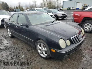 2001 Mercedes-Benz E-Class with VIN WDBJF70J31B324620, listed as a Copart auction lot 47748555 with 160,041 mi miles and Salvage Title. Bid and sale history available at carsss.com. Image 4.
