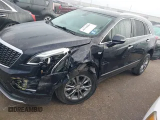2021 Cadillac XT5 FWD Premium Luxury with VIN 1GYKNCRS2MZ185678, listed as a IAAI auction lot 41143084 with 25,399 mi miles and . Bid and sale history available at carsss.com. Image 6.
