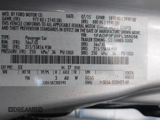 2015 Ford Focus SE with VIN 1FADP3F20FL355058, listed as a IAAI auction lot 41666337 with 144,887 mi miles. Bid and sale history available at carsss.com. Image 9.
