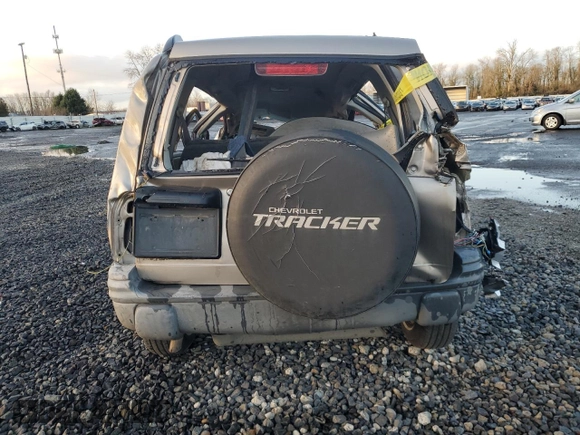 2003 Chevrolet Tracker ZR2 z VIN 2CNBJ734736913357, wystawiony jako Copart lot #86546884 z przebiegiem Nie podano mil oraz Nie do naprawy • Non repairable. Historia ofert i sprzedaży dostępna na DreamBid. Obrazek 6.