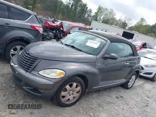 2005 Chrysler PT Cruiser Touring with VIN 3C3EY55E25T307023, listed as a IAAI auction lot 41921262 with 129,257 mi miles and . Bid and sale history available at DreamBid. Image 14.