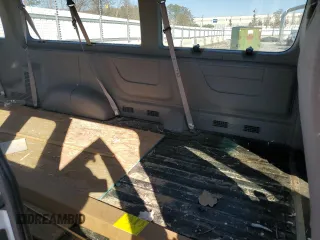 1999 Ford Econoline Passenger XL with VIN 1FBSS31L5XHC16908, listed as a Copart auction lot 83490434 with 159,900 mi miles and Salvage Title. Bid and sale history available at DreamBid. Image 11.