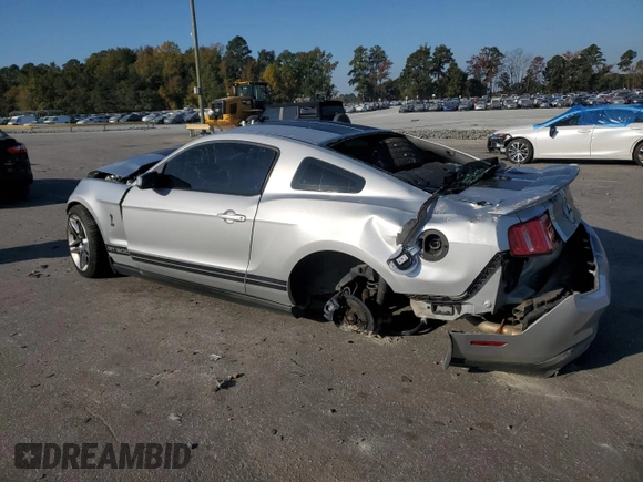 2010 Ford Mustang GT500 with VIN 1ZVBP8JS3A5156425, listed as a Copart auction lot 77348134 with 61,984 mi miles and Salvage title. Bid and sale history available at DreamBid. Image 2.