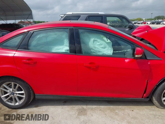 2015 Ford Focus SE z VIN 1FADP3F23FL233620, wystawiony jako IAAI lot #42073204 z przebiegiem 129 109 mil mil oraz . Historia ofert i sprzedaży dostępna na DreamBid. Obrazek 13.