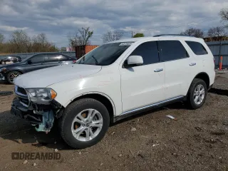 2013 Dodge Durango Crew z VIN 1C4RDJDG2DC699113, wystawiony jako Copart lot #53375805 z przebiegiem 183 679 mil mil oraz Szkoda całkowita • Salvage title. Historia ofert i sprzedaży dostępna na DreamBid. Obrazek 1.