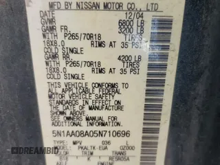 2005 Nissan Armada LE z VIN 5N1AA08A05N710696, wystawiony jako Copart lot #46854495 z przebiegiem 211 883 mil mil oraz Szkoda całkowita • Salvage title. Historia ofert i sprzedaży dostępna na DreamBid. Obrazek 13.