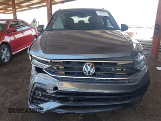 2024 Volkswagen Tiguan SE R-Line Black with VIN 3VVCB7AX4RM046261, listed as a IAAI auction lot 42327569 with 15,428 mi miles and . Bid and sale history available at DreamBid. Image 13.