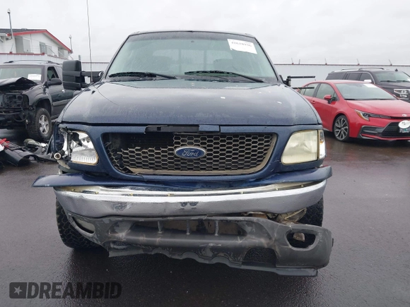 2003 Ford F-150 XLT with VIN 1FTRW08L33KC62060, listed as a IAAI auction lot 41618936 with 276,251 mi miles. Bid and sale history available at carsss.com. Image 12.