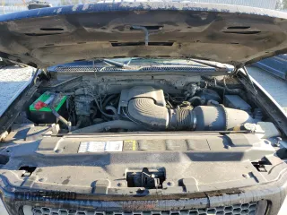 2003 Ford F-150 XLT with VIN 1FTRW08623KD45425, listed as a Copart auction lot 77605404 with 174,369 mi miles and Salvage Title. Bid and sale history available at carsss.com. Image 11.