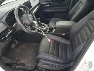 2023 Honda CR-V Sport Touring with VIN 2HKRS6H91PH203337, listed as a Copart auction lot 43698705 with 27,053 mi miles and Salvage Title. Bid and sale history available at DreamBid. Image 7.