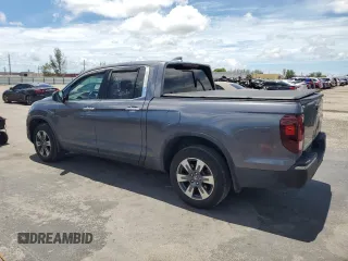 2017 Honda Ridgeline RTL-E with VIN 5FPYK3F74HB027130, listed as a Copart auction lot 60146905 with 99,964 mi miles and Salvage title. Bid and sale history available at DreamBid. Image 2.