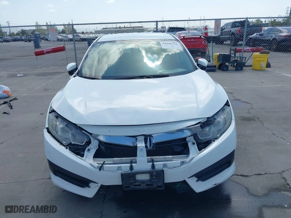 2016 Honda Civic Sedan LX with VIN 19XFC2F54GE215012, listed as a IAAI auction lot 42046334 with 146,348 mi miles. Bid and sale history available at carsss.com. Image 12.