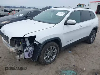 2020 Jeep Cherokee Latitude Plus with VIN 1C4PJLLB3LD543821, listed as a IAAI auction lot 41290132 with 130,137 mi miles. Bid and sale history available at carsss.com. Image 2.