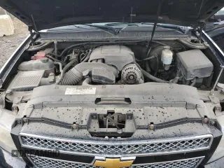 2010 Chevrolet Tahoe LTZ with VIN 1GNUKCE05AR164175, listed as a Copart auction lot 57223295 with 423,010 mi miles and Salvage title. Bid and sale history available at DreamBid. Image 12.