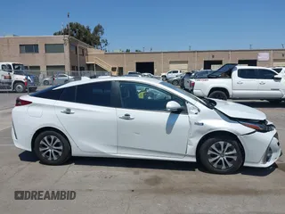 2021 Toyota Prius LE z VIN JTDKAMFP3M3187644, wystawiony jako IAAI lot #42443171 z przebiegiem 126 977 mil mil oraz . Historia ofert i sprzedaży dostępna na DreamBid. Obrazek 12.