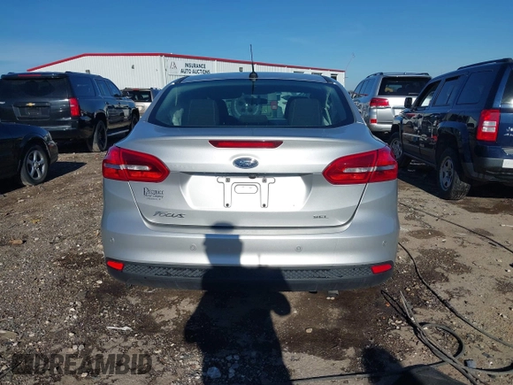 2017 Ford Focus SEL with VIN 1FADP3H24HL327179, listed as a IAAI auction lot 41607974 with 86,306 mi miles. Bid and sale history available at carsss.com. Image 16.