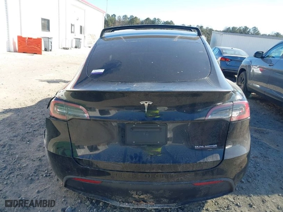 2022 Tesla Model Y Performance with VIN 7SAYGDEF2NF562903, listed as a IAAI auction lot 41342089 with 52,814 mi miles. Bid and sale history available at carsss.com. Image 16.