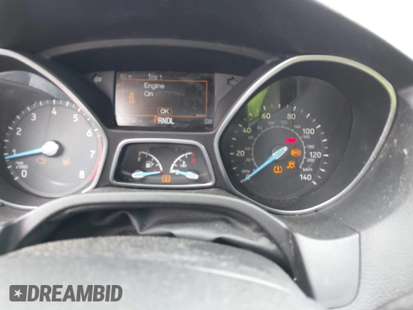 2016 Ford Focus SE z VIN 1FADP3F2XGL397092, wystawiony jako IAAI lot #42619802 z przebiegiem 232 252 mil mil oraz . Historia ofert i sprzedaży dostępna na DreamBid. Obrazek 7.