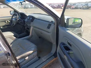 2003 Honda Pilot EX with VIN 2HKYF18503H610799, listed as a IAAI auction lot 41528867 with 323,810 mi miles. Bid and sale history available at carsss.com. Image 5.