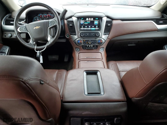 2015 Chevrolet Tahoe LTZ with VIN 1GNSKCKC8FR133323, listed as a Copart auction lot 47989525 with 123,391 mi miles and Salvage Title. Bid and sale history available at carsss.com. Image 8.