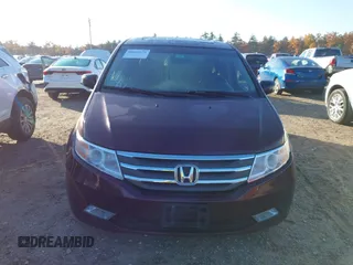 2012 Honda Odyssey Touring z VIN 5FNRL5H9XCB067841, wystawiony jako IAAI lot #40631672 z przebiegiem 210 237 mil mil oraz . Historia ofert i sprzedaży dostępna na DreamBid. Obrazek 13.