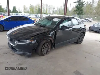 2024 Mazda CX-30 2.5 S with VIN 3MVDMBAM5RM633007, listed as a IAAI auction lot 42014511 with 11,895 mi miles. Bid and sale history available at carsss.com. Image 17.