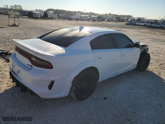 2022 Dodge Charger SRT Hellcat Widebody with VIN 2C3CDXL96NH101698, listed as a Copart auction lot 81342124 with 15,293 mi miles and Salvage Title. Bid and sale history available at carsss.com. Image 3.
