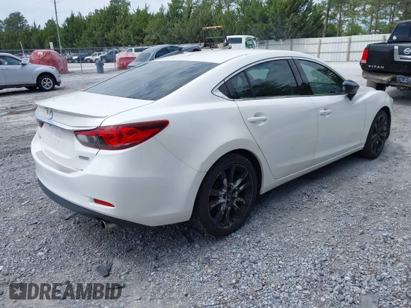 2014 Mazda 6 i Grand Touring with VIN JM1GJ1W67E1139945, listed as a IAAI auction lot 42194243 with 205,545 mi miles. Bid and sale history available at carsss.com. Image 4.