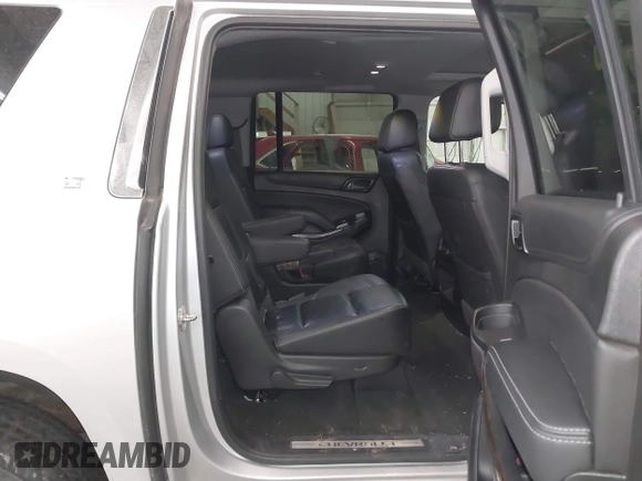 2018 Chevrolet Suburban LT z VIN 1GNSKHKC2JR201282, wystawiony jako IAAI lot #41312994 z przebiegiem 99 783 mil mil oraz . Historia ofert i sprzedaży dostępna na DreamBid. Obrazek 8.